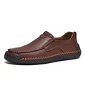Dark brown leather slip-on loafers for men with decorative hand-stitched details - EU 38 / Deep Brown