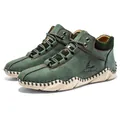 Detail of dark green nubuck leather boots with hand-stitched soles and knited collars - 38 / Cyan (6623)