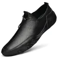 Men's black leather slip-on shoes with metal drawstrings and wavy rubber sole - EU 38 / Black