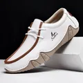 White low-top men's casual shoe with brown leather trim and Salkin logo on the side - 38 / 1801 White