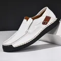 Men's white leather loafers with brown accents and stitched rubber soles - 38 / White