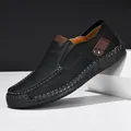Men's black pebble leather loafers with brown trim and contrast hand-stitching detail - 40 / Black
