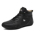 Bottines décontractées en cuir noir pour hommes avec texture grainée et logo bélier - EU 38 / Noir