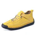 Bright yellow mid-top casual leather shoes with handmade stitching and black rubber soles - EU 38 / Yellow