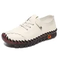 Beige soft leather loafers with thick brown rubber soles and casual lace-up design - EU 35 / White