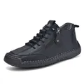 Black leather mid-top men's casual boots with side zipper and rubber sole detail - Black