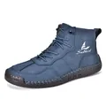 Detailed close-up of blue suede leather boots with stitching and white Salkin logo - EU 38 / Dark Blue