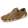 Brown vintage men's casual leather shoes with decorative stitching and wave rubber sole - Tan