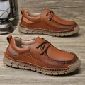 Men's retro dark brown leather loafers with hand-stitched details and rubber lug soles - EU 38 / Red Brown