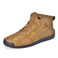 Detail of retro brown leather high-top boots featuring durable stitching and Salkin logo - EU 38 / Tan