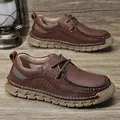 Brown leather men's casual loafers with hand-stitched detailing and thick anti-slip sole - EU 38 / Deep Brown