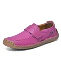 Detail of purple leather loafer with hand-stitched seams and rubber sole text - EU 36 / Rose Red (2522-1)