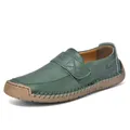 Detail of dark green leather loafer featuring handmade stitching and rubber outsole - EU 36 / Dark Green (2522-1)