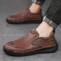 Brown slip-on men's leather loafer featuring contrast hand-stitched detailing and soft sole - EU 38 / Red Brown