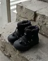 Detalle del tejido de nailon impermeable y del cordón ajustable en botas de nieve negras - EU 37 / Negro