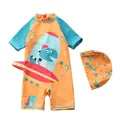 Détail du maillot de bain garçon orange avec motif dinosaure, manches longues et bonnet - S / Motif Thème Aérospatial Espace Orange Bleu