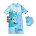 Détail du maillot de bain bleu pour enfants avec motif dinosaure et bonnet assorti - S / Motif Course de Dinosaures Bleu Ciel