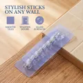 Detailed view of 6-hook wall rack with purple base for tile and wood surfaces - 37 Silk Thick Oil Glue Hook