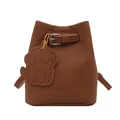 Brown lychee leather mini bucket bag with a cute dog charm and silver metal buckle - Brown