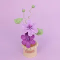 Handmade crochet purple flower pot with 'Handmade' leather tag, ideal holiday gift. - Gradient Purple