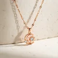 Collana in acciaio inossidabile oro rosa con ciondoli sole e luna e zircone lucente - Oro rosa