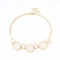 Elegant gold necklace with seven white marble enamel circular charms and lobster clasp - Necklace