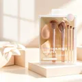 7-piece makeup brush set with five brushes and two pink beauty blenders in a gift box - 7-Piece Set / Gold