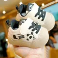 Toddler walking shoes in cream and black leather with non-slip soles and velcro strap - 11.5cm / Black
