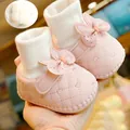 Pink infant walking shoes with heart quilting, bow detail, and warm plush lining - Size 11 / Pink