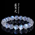 5A Grade natural blue moonstone bracelet with blue sheen on a sleek black background - 9-10mm Single Strand (Approx. 19 Beads) / 5A Grade Creamy Blue Moonstone