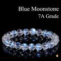 Premium 7A grade blue moonstone beaded bracelet with luminous blue flash on black background - 9-10mm Single Strand (Approx. 19 Beads) / 7A Grade Creamy Blue Moonstone