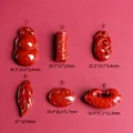 Selezione di ciondoli in cinabro rosso scuro in varie forme tra cui foglie e serrature - Forma di Foglia (Stile 4) / Rosso