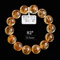 Gouden citrien armband 6A met 15,5mm natuurlijke ronde kralen op zwarte achtergrond - 15.5mm Ronde Kraal Stijl (82#) / 6A Intense Gouden Citrien