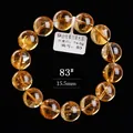 7A grade natural citrine bead bracelet 15.5mm with 74.5g weight on black background - 15.5mm圆珠款式(83#) / 6A金红暴力黄水晶