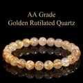 Natural AA grade gold rutilated quartz beaded bracelet with clear golden hair needles - AA Grade