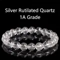 Silver rutilated quartz bead bracelet with fine needle-like inclusions on black background - 7-7.8mm (Single Loop) / A Grade
