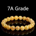 Natural 7A grade golden rutilated quartz bead bracelet in style 3 with clear crystal - 16-16.8mm (Approx. 14 Beads) / 7A Grade Gold Rutilated Style 3