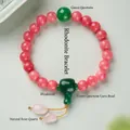 Dettaglio bracciale in rodocrosite con giada verde e ciondolo in quarzo rosa - Stile Rodocrosite e Giadeite al Cromo 8mm
