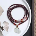 Garnet multi-layer bracelet with jadeite leaf and gourd charms in Chinese zen style - A1 Jade Gourd