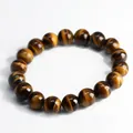 Polished natural tiger eye stone bead bracelet with yellow and brown chatoyant bands - 10mm Bead Diameter