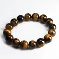 Polished natural tiger eye beaded bracelet with 10-12mm round stones and chatoyancy - 12mm Bead Diameter
