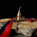 Brass gourd pendant with Shurangama Mantra tag and tricolor tassel on wooden base - Red Blue Rope Shurangama Mantra