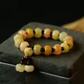 Handcrafted pumpkin-shaped jade beads bracelet with colorful natural stones and silk cord - Large Pumpkin Bead With Tassel