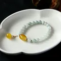 Beaded jadeite bracelet with yellow agate accents and 14K gold plated tassel charm - Yellow Agate Pendant Style / Light Green With Yellow Agate