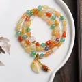 Detailed close-up of multi-layer natural stone bracelet with jade beads and leaf charm - Multilayer Golden Silk Jade Leaf Style