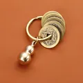 Vintage brass keychain with five emperor coins and a polished gourd charm pendant - Brass Solid Small Gourd Five Emperor Coins