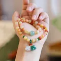 Natural quartz beads bracelet with lily of the valley pendants in neo-Chinese style - Double Layer Lily of the Valley Bracelet
