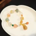 Handmade beaded bracelet with colorful pumpkin beads and a gold gourd charm pendant - Multi-color Pumpkin Bamboo Gourd