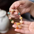 Handcrafted pumpkin bead bracelet with colorful jade stones and a gold gourd charm - Multi-color Pumpkin Bamboo Gourd New Spacer