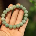 Natural light green Bodhi bead bracelet with smooth drum-shaped polished stones - Light Green Floating Flower Barrel Bead
